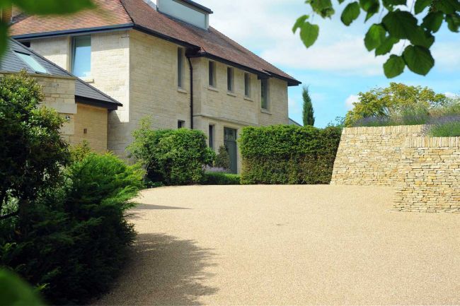 What had previously been a long and narrow driveway is now broadened